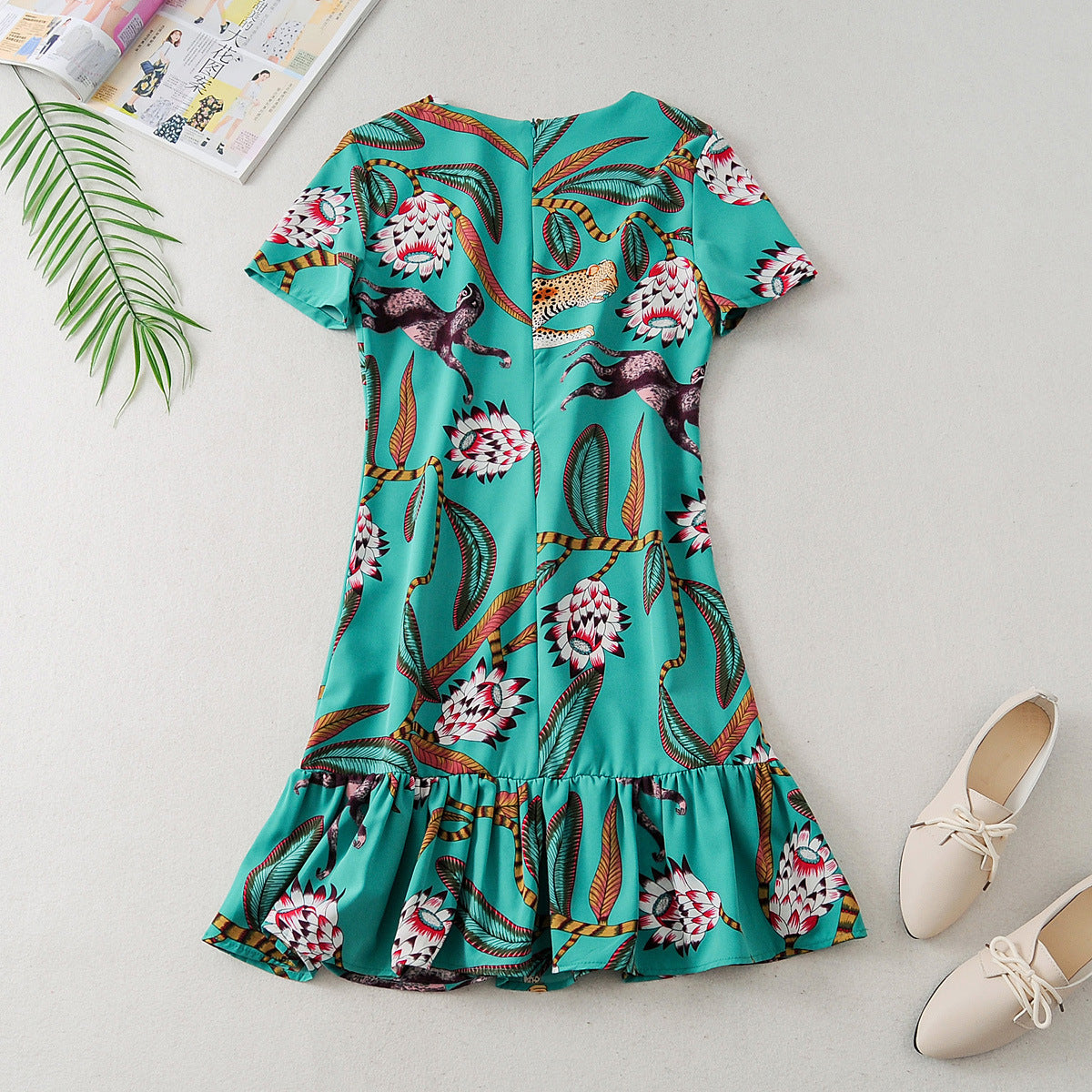 Vestido estampado animal con volantes