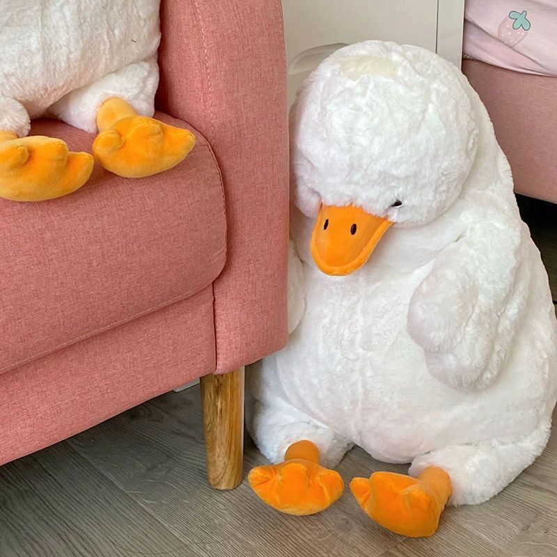 Oreiller mignon en peluche de canard terne