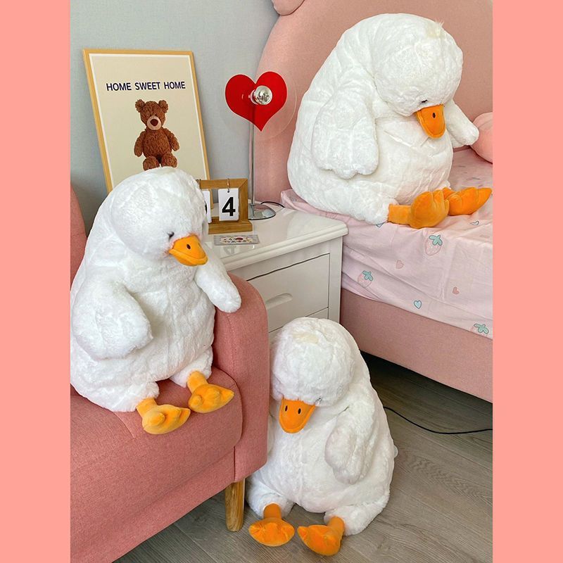 Oreiller mignon en peluche de canard terne