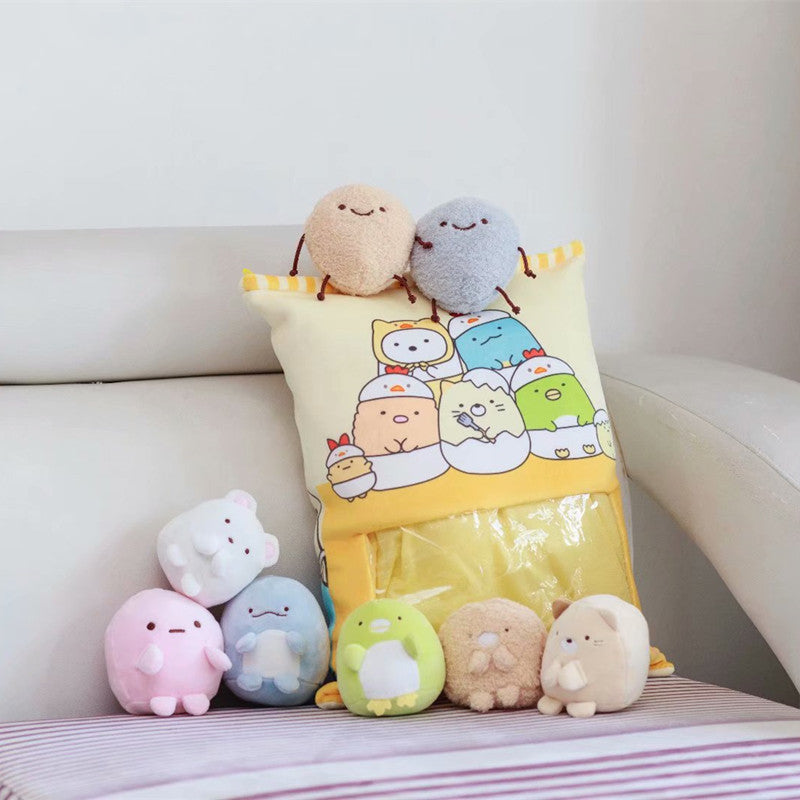 Una bolsa grande de juguetes de peluche suaves con forma de pudín de animales pequeños