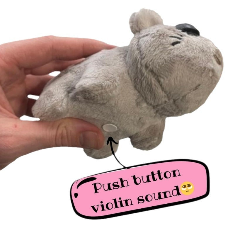 Decoración de juguete de peluche con forma de hámster triste