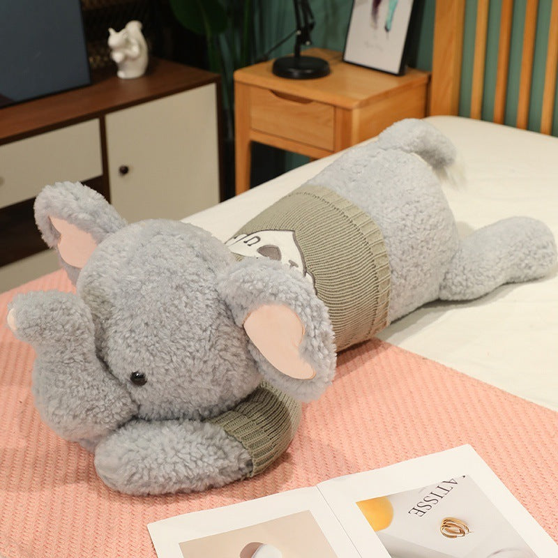 Grand oreiller en peluche en forme d'éléphant couché