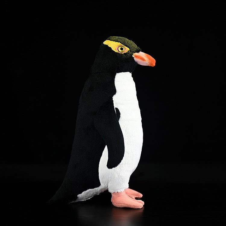 Poupée animale en peluche de simulation de pingouin aux yeux jaunes