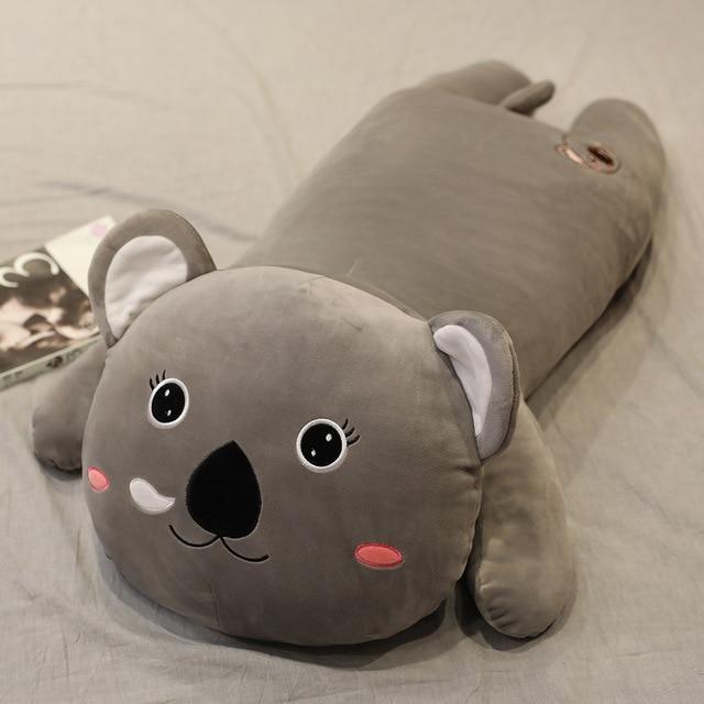 Almohada de peluche de animales.