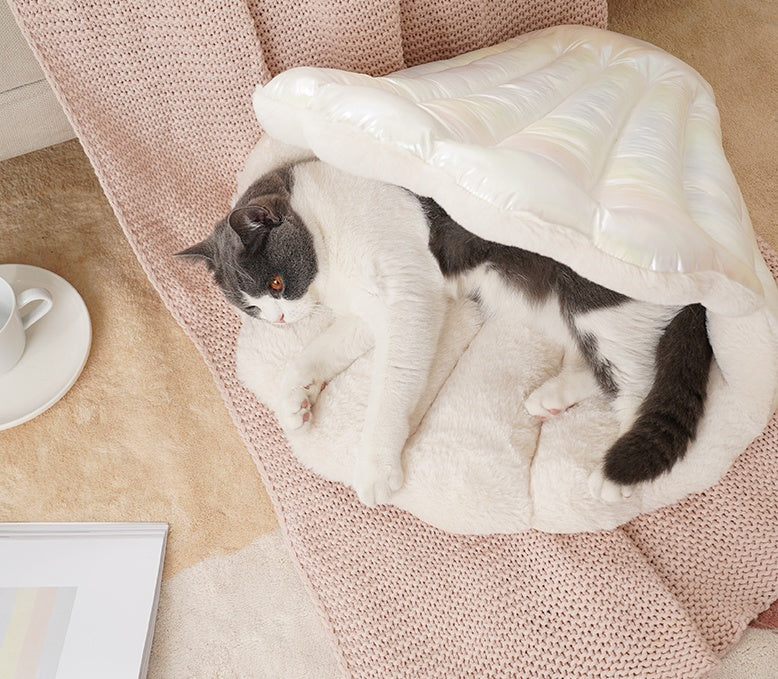 Cama para gatos pequeña para mantenerse caliente en invierno