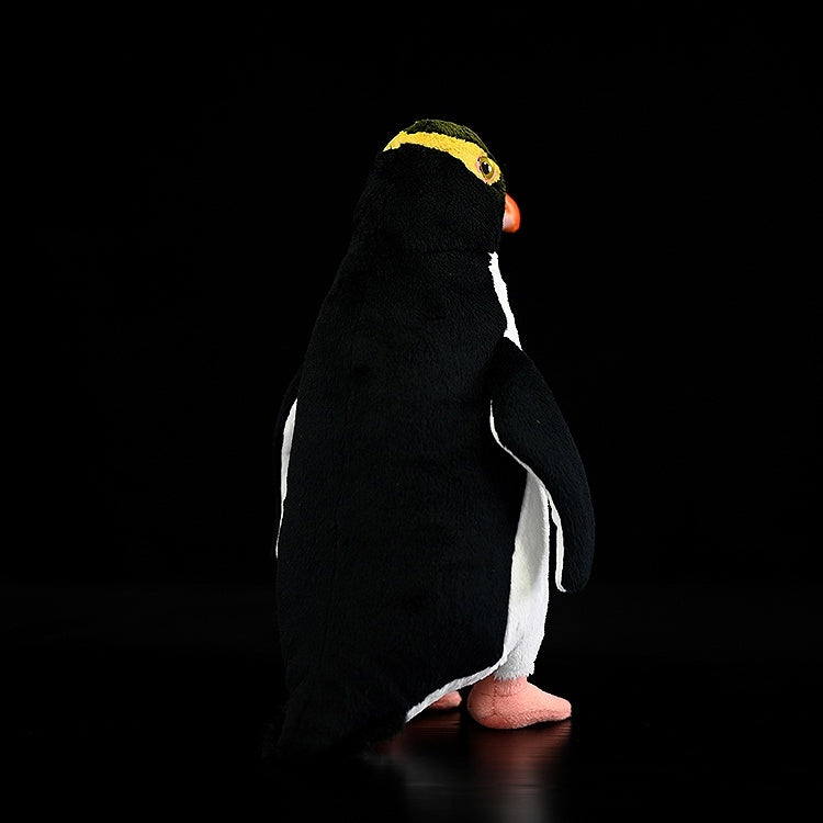 Poupée animale en peluche de simulation de pingouin aux yeux jaunes