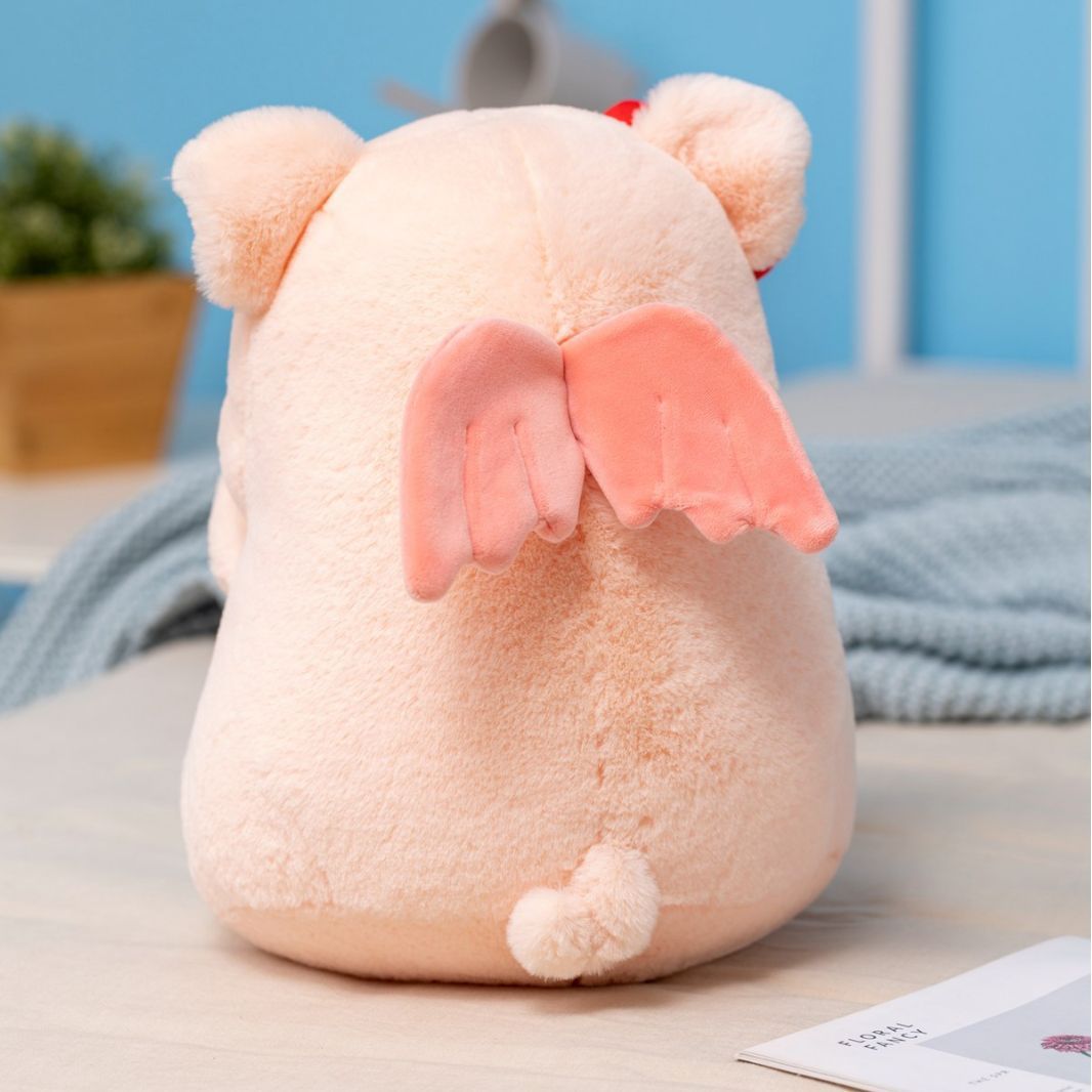 Muñeco de peluche de cerdo ángel