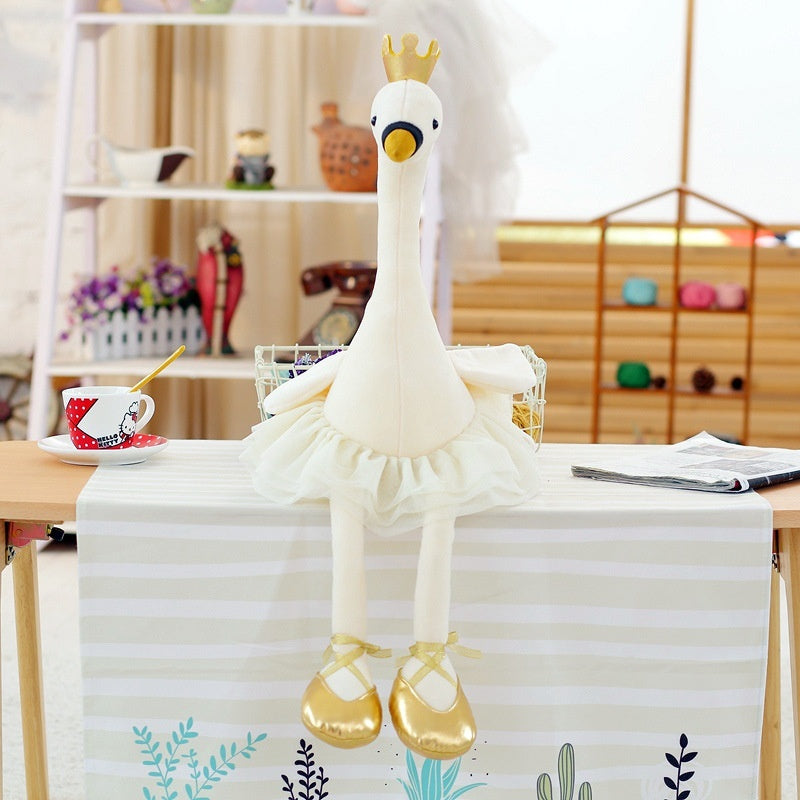 Muñeco de peluche con forma de cisne blanco y corona de dibujos animados